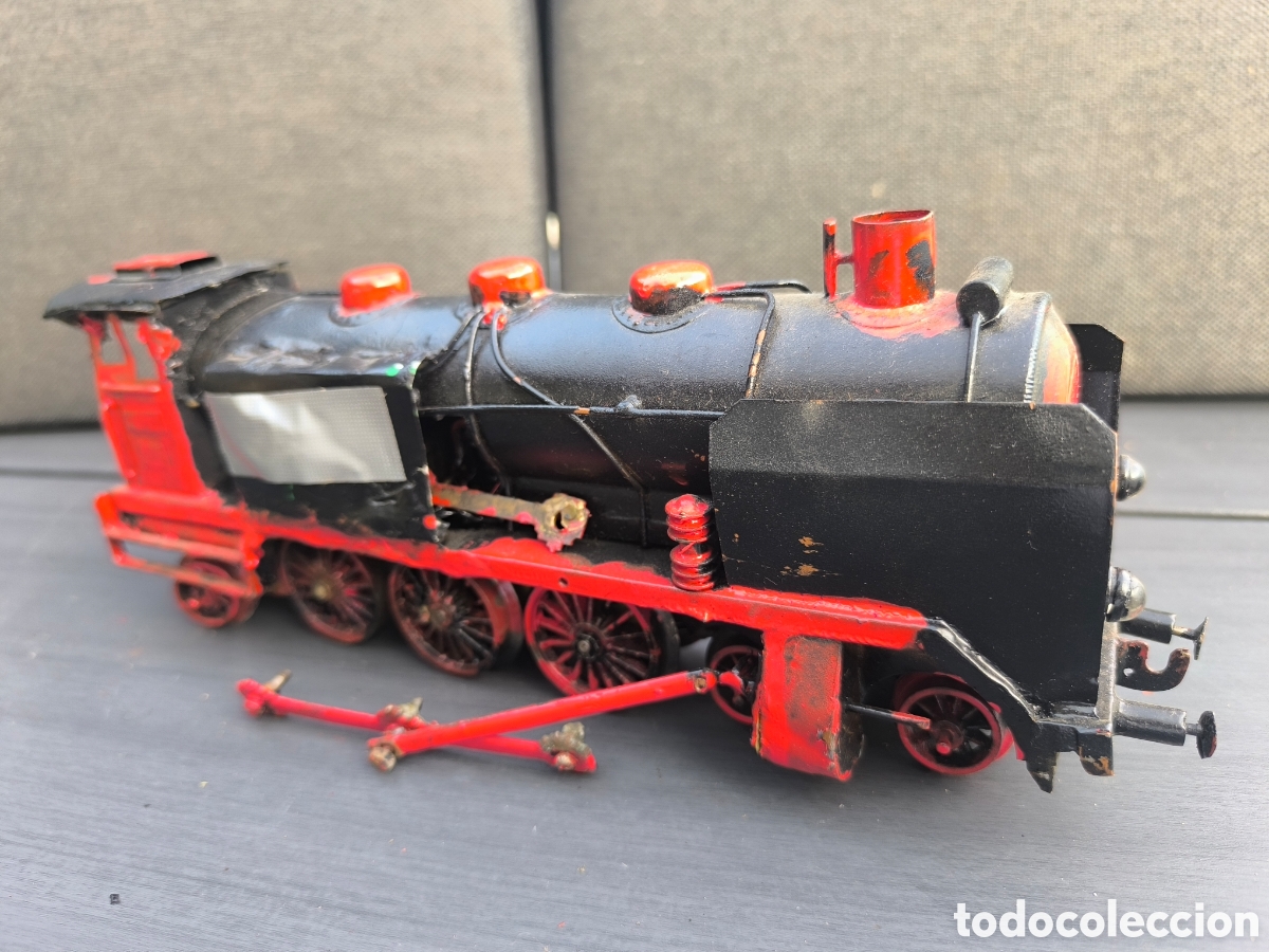 Trenes escala: antigua locomotora de metal, no le veo marc
