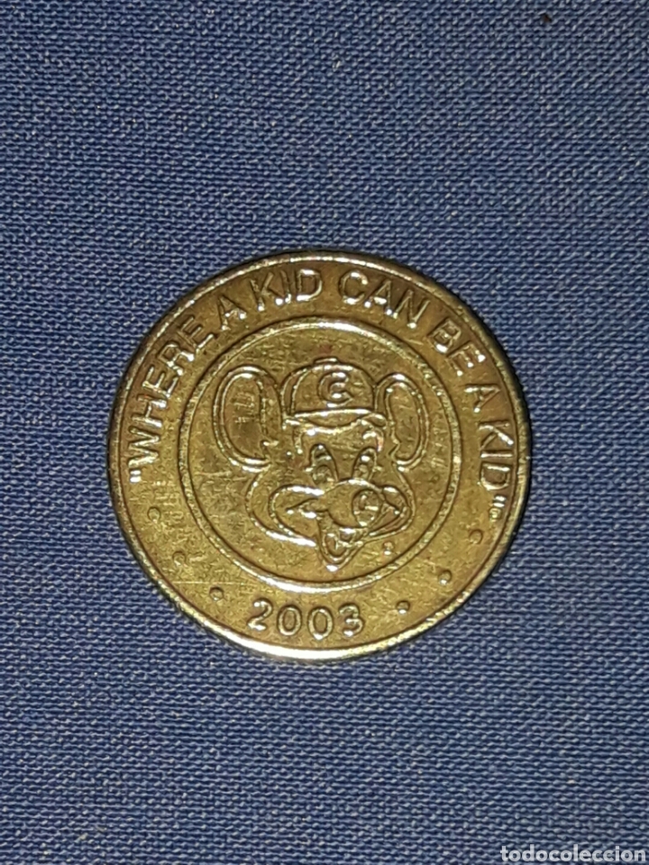 Trofeos y medallas: MONEDA FICHA WHERE A KID CAN BE A KID 2003 - Foto 1