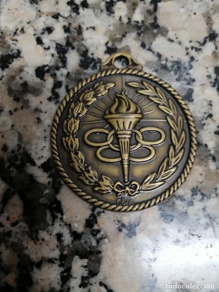 Trofeos y medallas: MEDALLA AROS ANTORCHA OLIMPICA - Foto 1