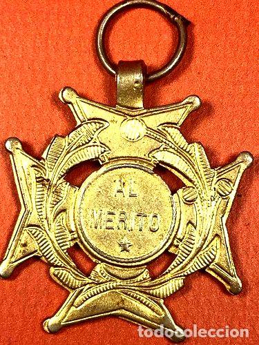 Trofeos y medallas: medalla al merito dorada 435 - Foto 1