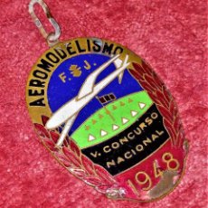 Trofeos y medallas: MEDALLA DEL V CONCURSO NACIONAL DE AEROMODELISMO. METAL ESMALTADO.ESPAÑA. 1948