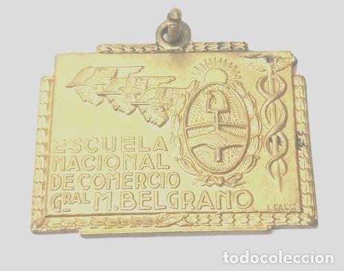 Trofeos y medallas: medalla escuela nacional de comercio gral - Foto 1