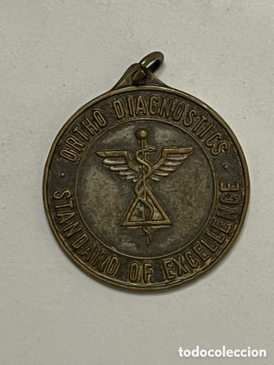 Trof&eacute;us e medalhas: MEDALLA. Ortho Diagnostics Standard of Excellence fabricada por The Robbins Company