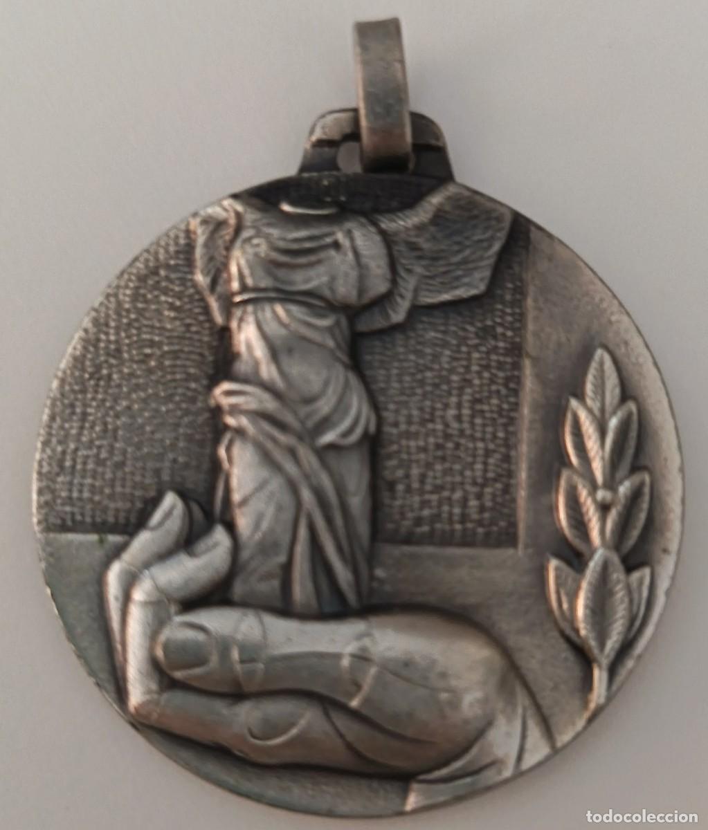 Trofeos y medallas: Medalla metalica. Campeon de balonmano. Deportes.