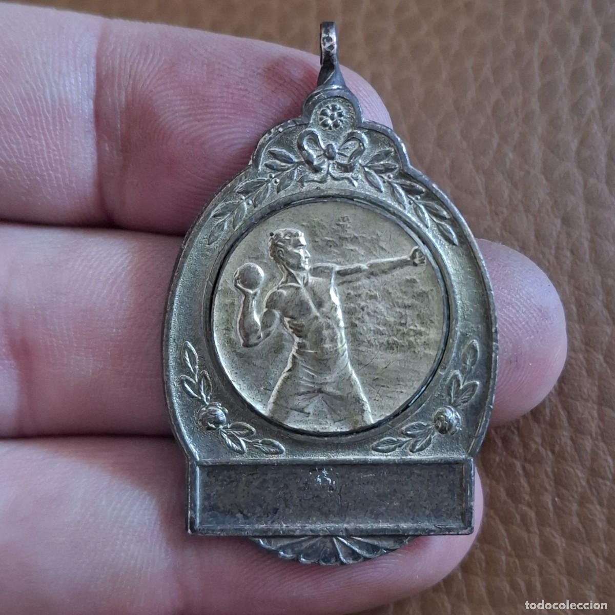 Trofeos y medallas: Curiosa y antigua medalla de la zamiento de peso