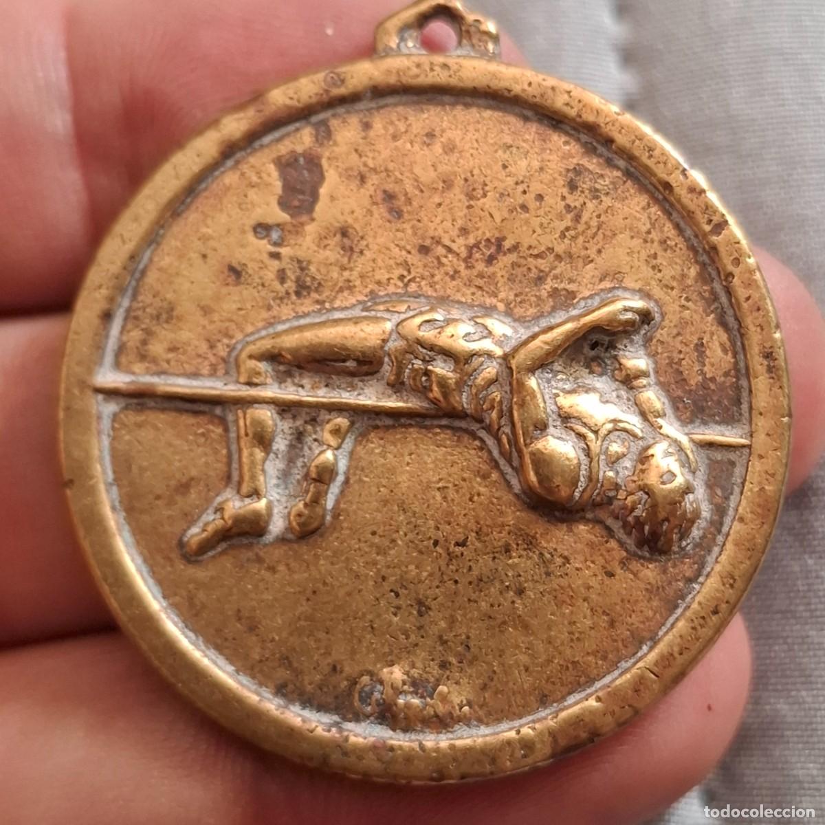 Trofeos y medallas: Antigua medalla de salto de altura