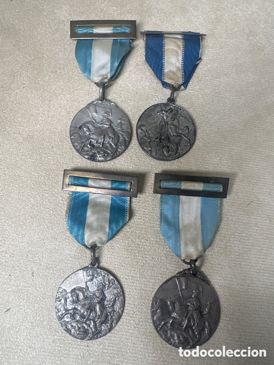 Trofeos y medallas: Lote de 4 antiguas Medallas Escolares - Premio de Asistencia y Puntualidad, diversos a&ntilde;os