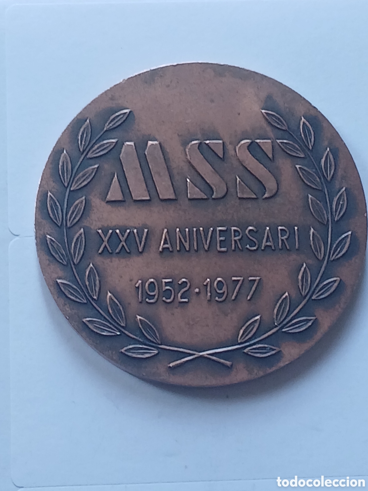 Trofeos y medallas: Medalla MSS conmemorativa del XXV aniversario de MSS, celebrando el per&iacute;odo de 1952 a 1977.Mutu