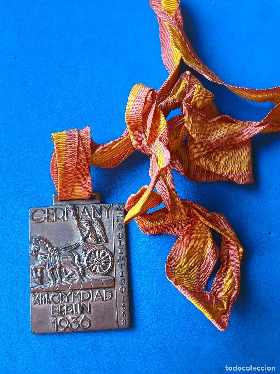 Trofeos y medallas: Falange. Medalla de la Delegaci&oacute;n Nacional de Juventudes VI Juegos. O.J.E. Arqueros. Baloncesto. &Aacute;vi
