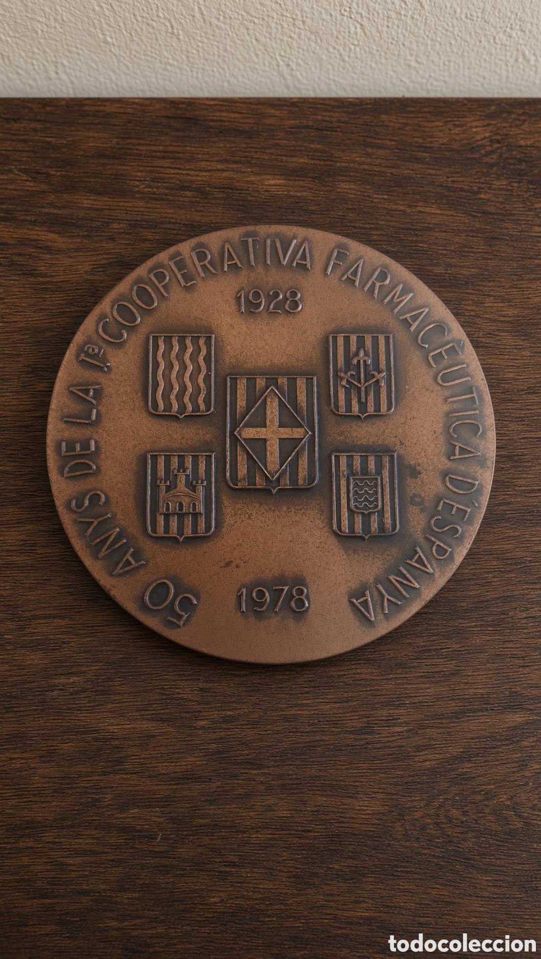 Trofeos y medallas: medallia vallmitjana 50 anys de la cooperativa farmac&eacute;utica de espania 1928-1978.Material: Bronce.