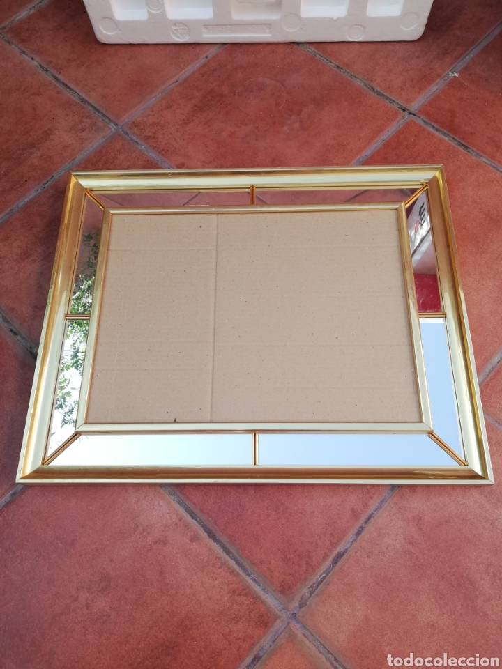 Arte: Marco a&ntilde;os 80 cuadros dorado