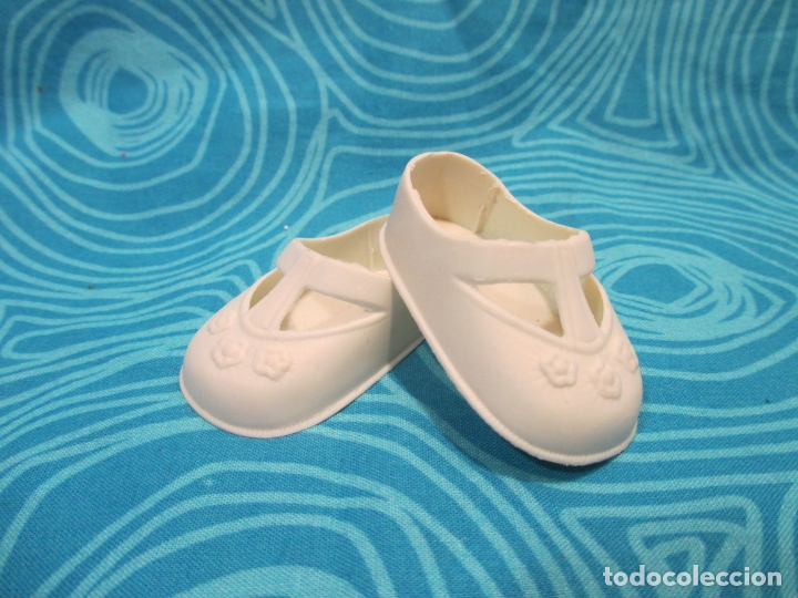 Zapatos de plastico discount blancos