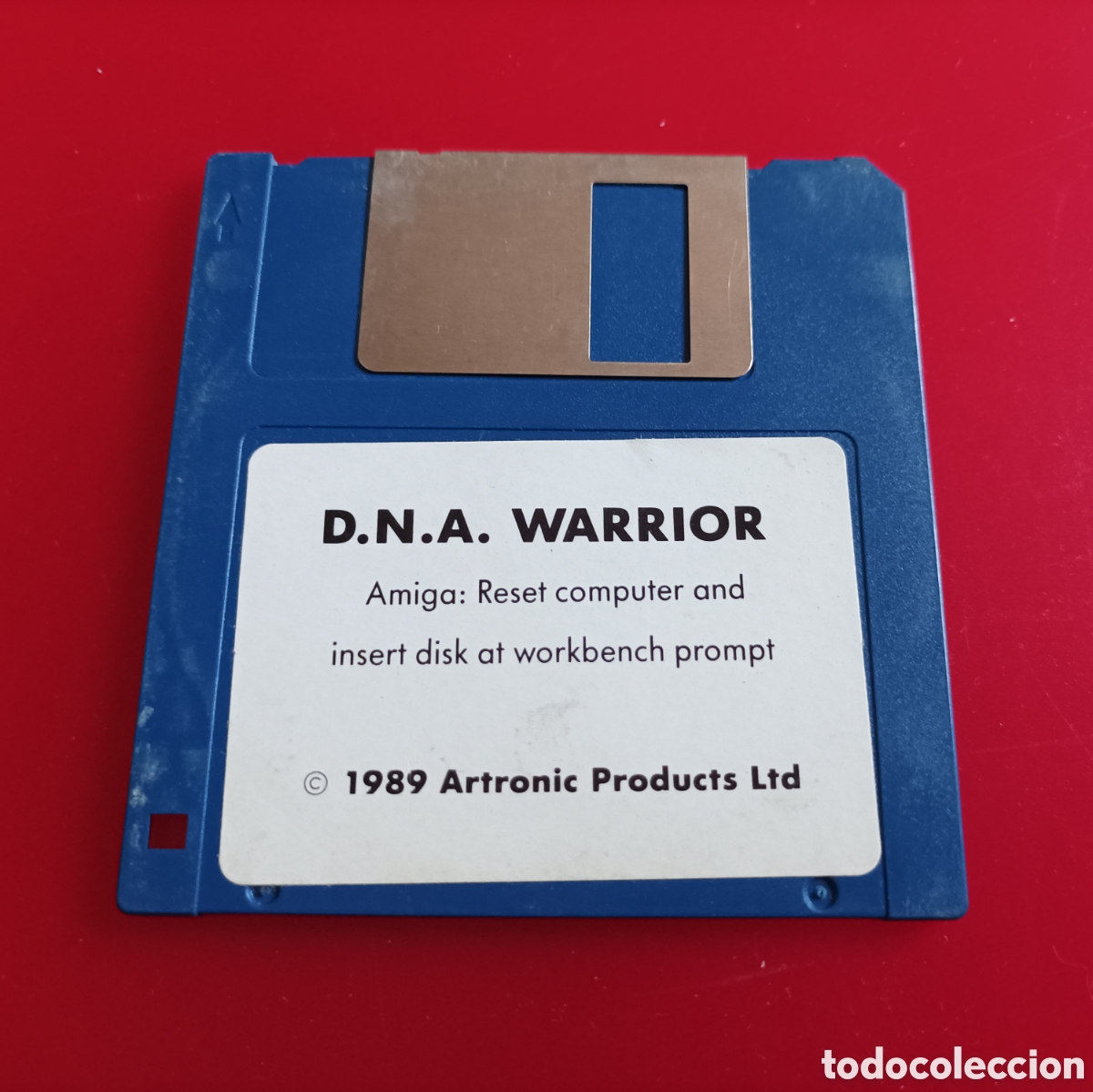 Videojuegos y consolas: Diskette Commodore Amiga Juego D.N.A. WARRIOR 1989 - Foto 1