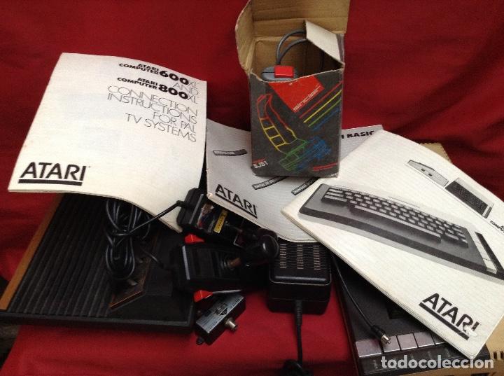 Videojuegos y consolas: Lote atar&iacute; , 2 consolas , 4 mandos transformador ,instrucciones , - Foto 12
