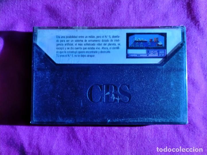 Videojuegos y consolas: SHORT CIRCUIT - CINTA CASETE JUEGO COMMODORE - PRECINTADA - Foto 2