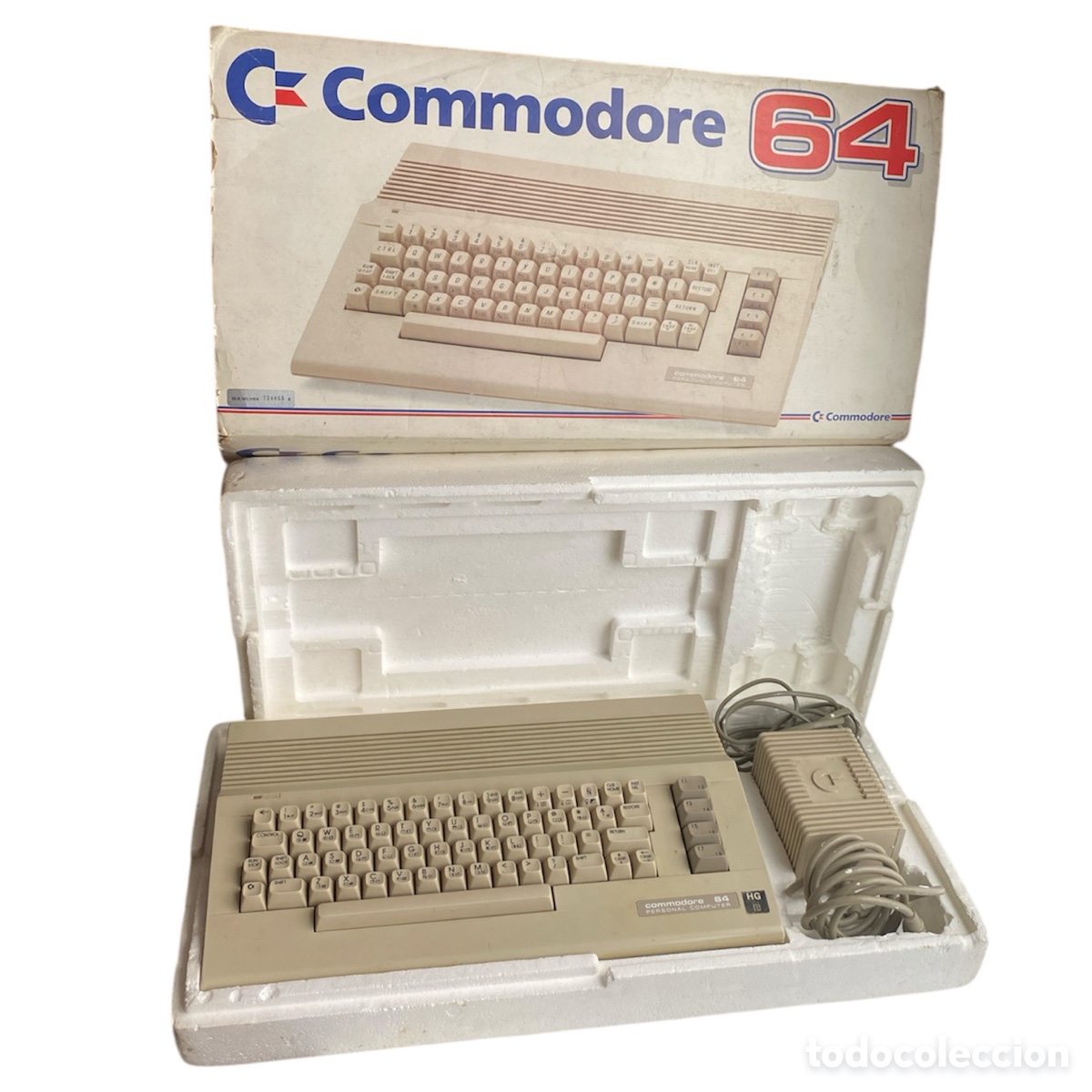 Videojuegos y consolas: Ordenador Commodore 64 en su caja y con corchos - Foto 1