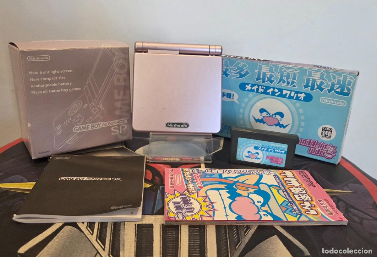 Videojuegos y consolas: Game Boy Advance SP Pearl Pink + Made in Wario CIB