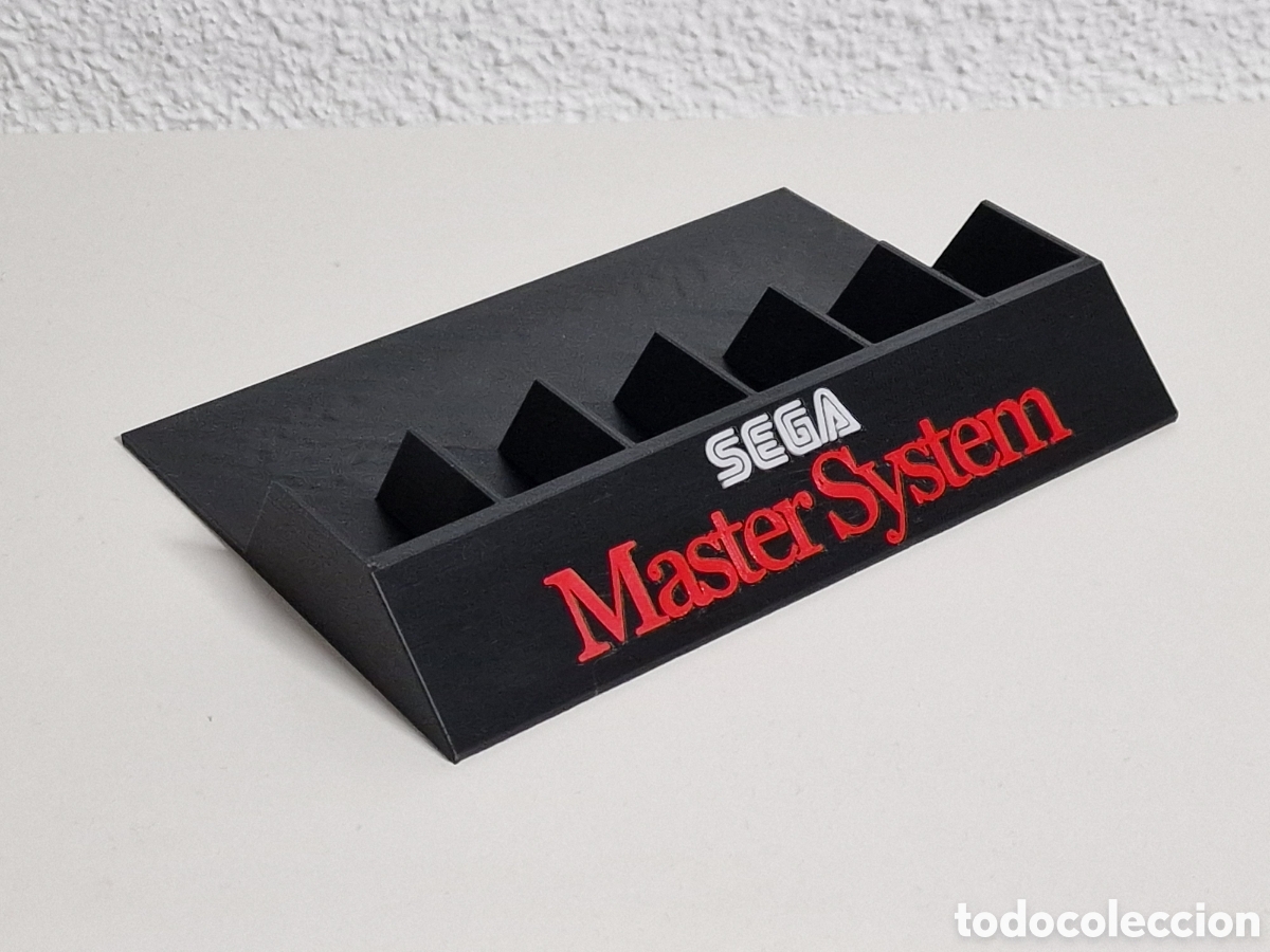 Videojuegos y consolas: Soporte expositor juegos sega master system - Foto 1
