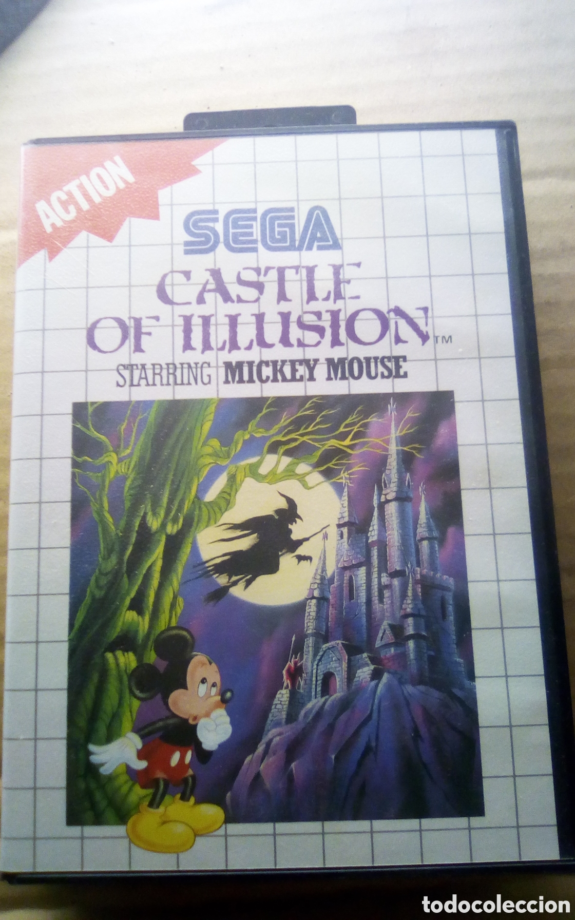 Videojuegos y consolas: Caja vac&iacute;a del juego Castle of illusion. Starring Mickey Mouse. Action. Sega. 1990. Solo caja vac&iacute;a.