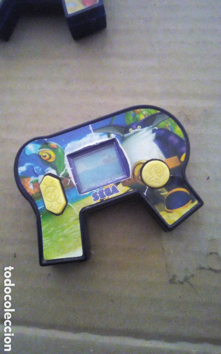 Videojuegos y consolas: Mini juego port&aacute;til. &copy; Sega 2006. Made for McDonald's Corp. Mide 8 cm., pila agotada, a cambiar.