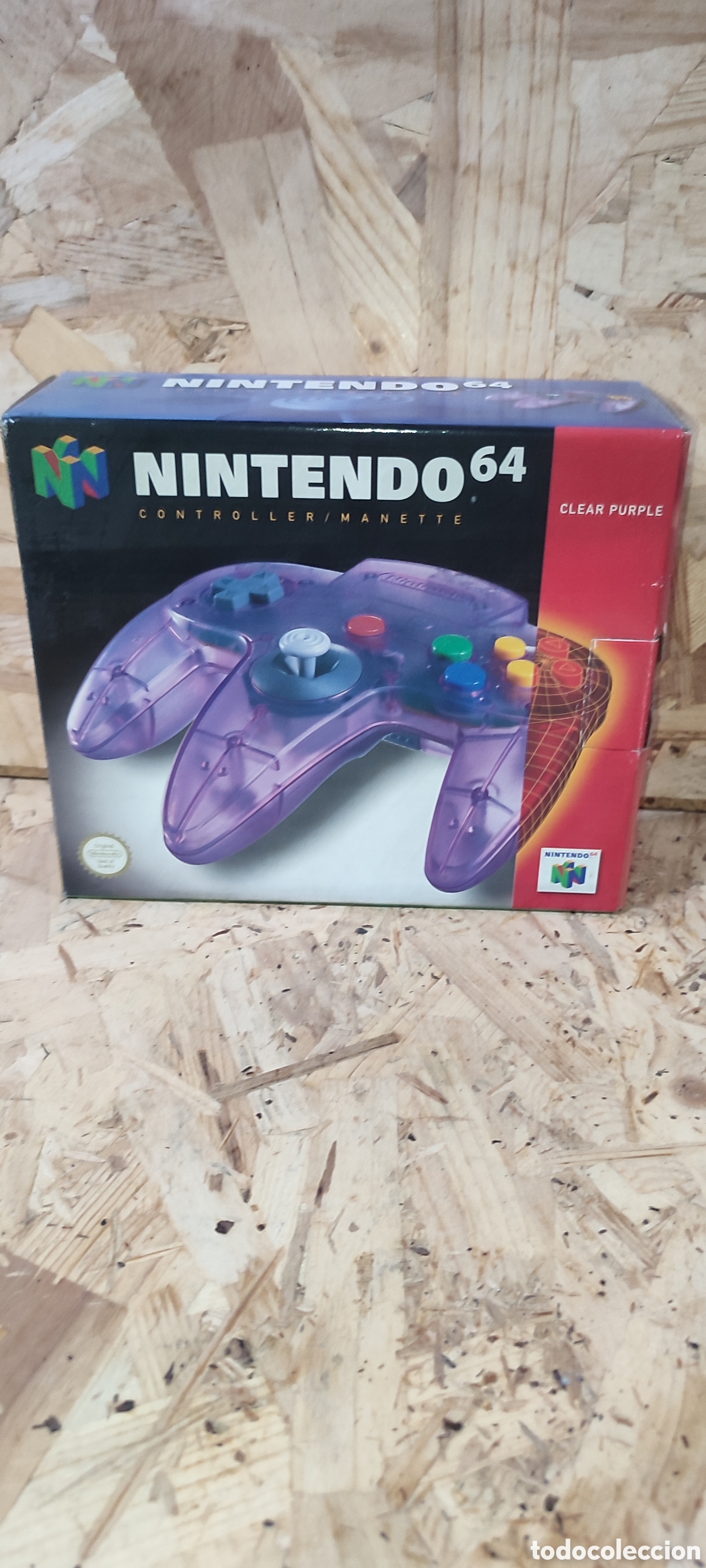 Videojuegos y Consolas: Nintendo 64, mando traslucido purpura nuevo en su caja procedente de una tienda cerrada hace a&ntilde;os