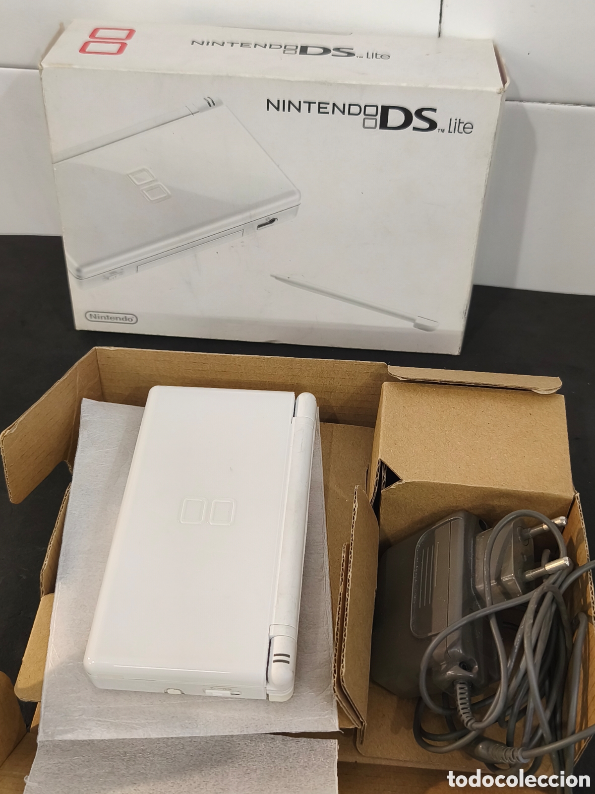 Videojuegos y consolas: Nintendo DS Lite, funciona, con caja - Foto 1