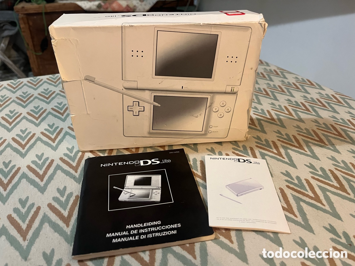 Videojuegos y Consolas: Caja + manual Nintendo DS Lite blanca