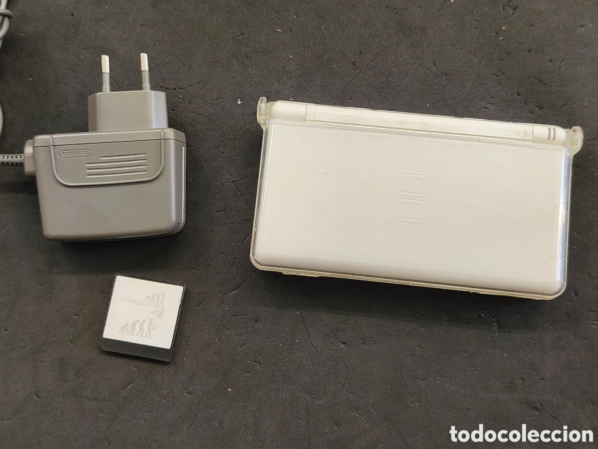 Videospiele und Konsolen: Nintendo DS lite con cargador, cartucho con varios juegos y protector