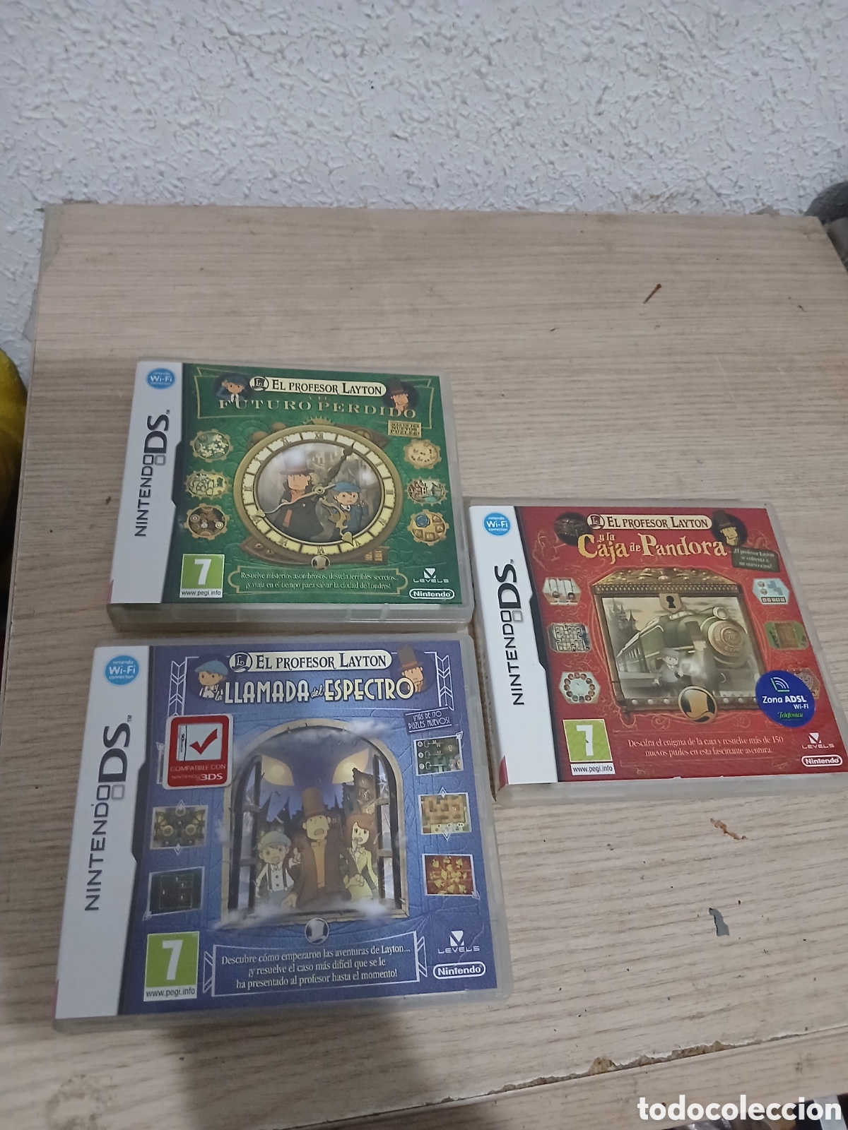 Videojuegos y consolas: 3 CAJAS VACIAS EL PROFESOR LAYTON CON MANUELES,,VER FOTOS