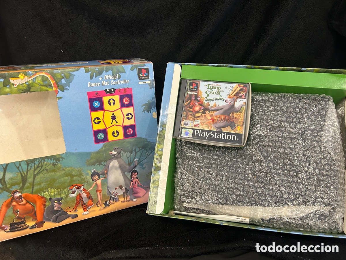 Videojuegos y consolas: Set Ps1 libro de la selva con alfombra de baile - Foto 1