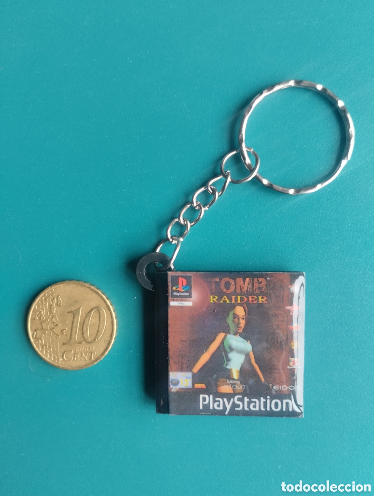 Videojuegos y Consolas: Llavero Tomb Raider Play Station