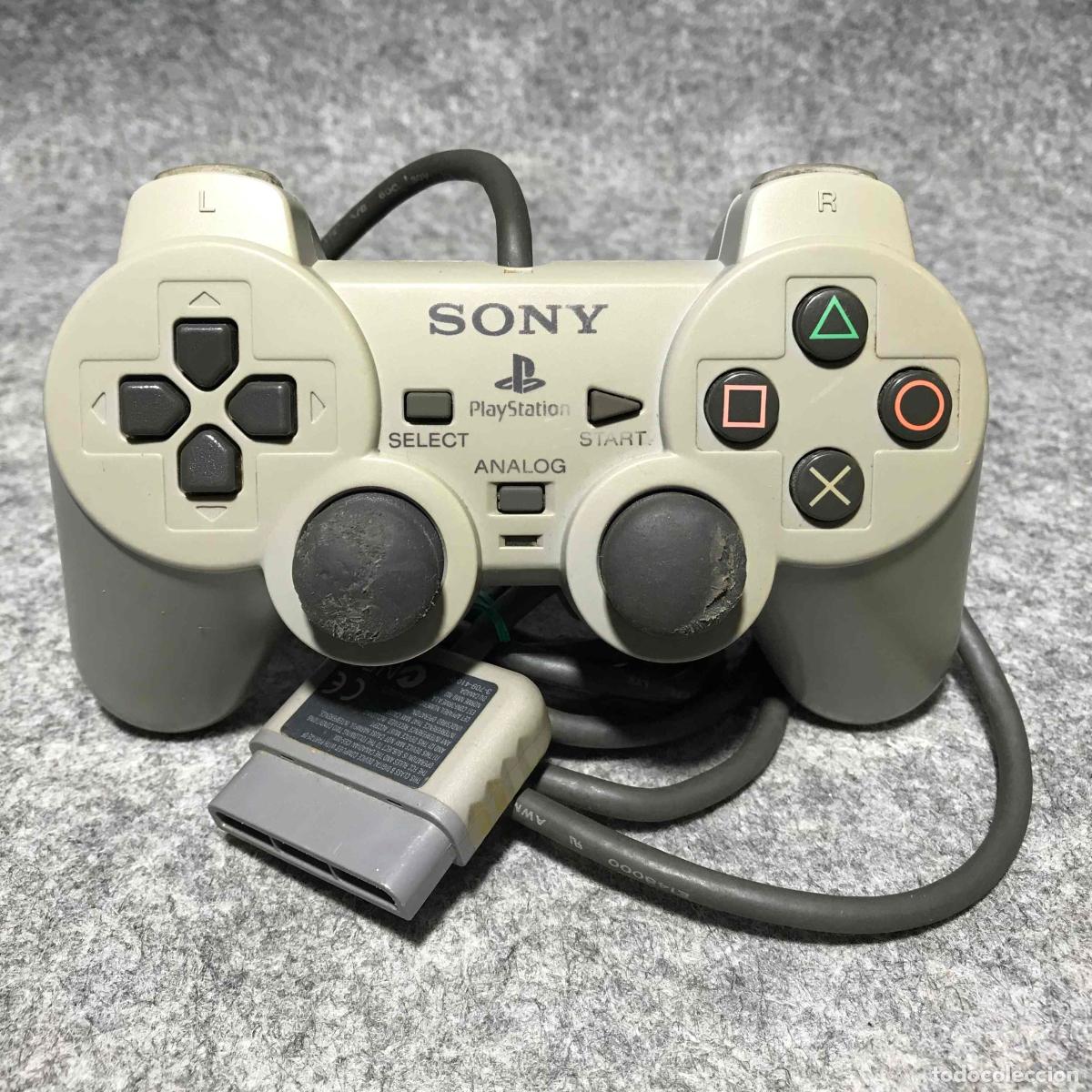 Videojuegos y consolas: DUALSHOCK SCPH-1200 GRIS