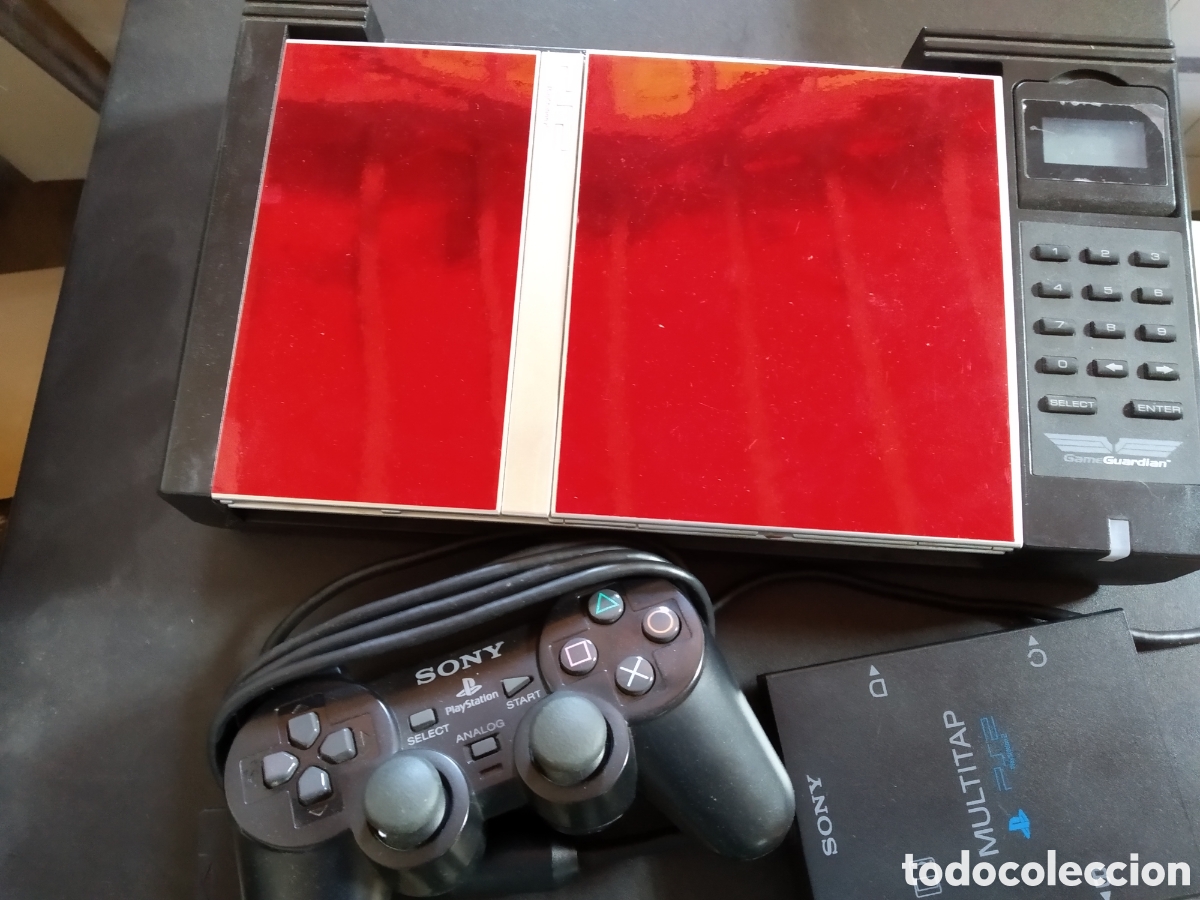 Videojuegos y Consolas: Lote 2 Sony PlayStation 2 Silver Tuneadas Maquadas vinilo rojo + Control Parental
