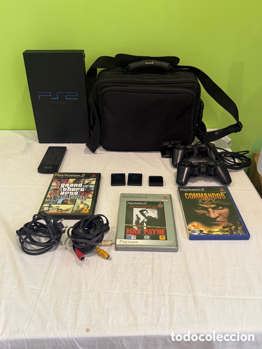 Videojuegos y consolas: Sony PlayStation 2 PS2 con malet&iacute;n original, 2 mandos, 3 juegos y accesorios