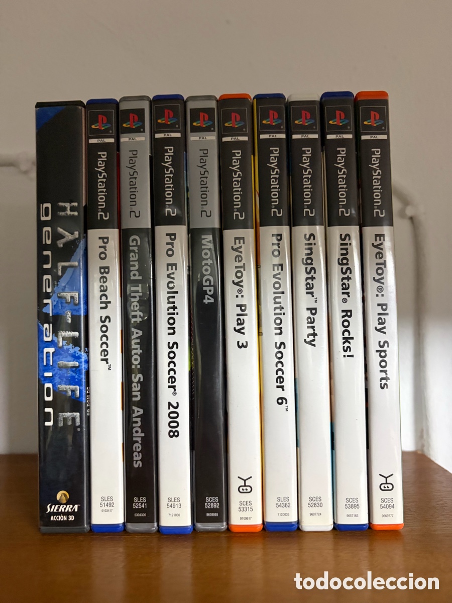 Videojuegos y consolas: Lote de videojuegos ps2 playstation con libreto y CD MotoGP4 singstar beach soccer pro evolution