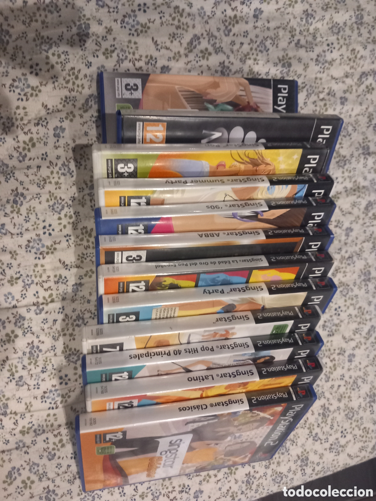 Videojuegos y consolas: 12 juegos para PlayStation 2, todos son SingStar