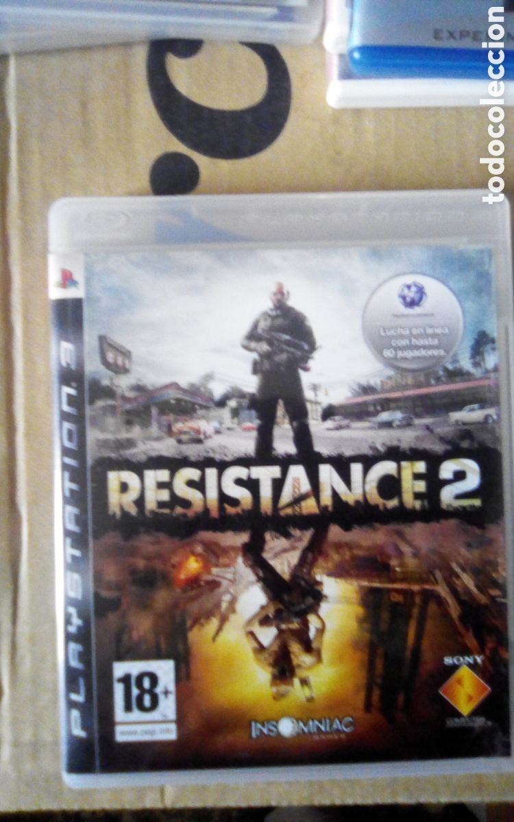 Videojuegos y consolas: Caja vac&iacute;a PS3 del juego Resistance 2. Con libreto. A&ntilde;o 2008.