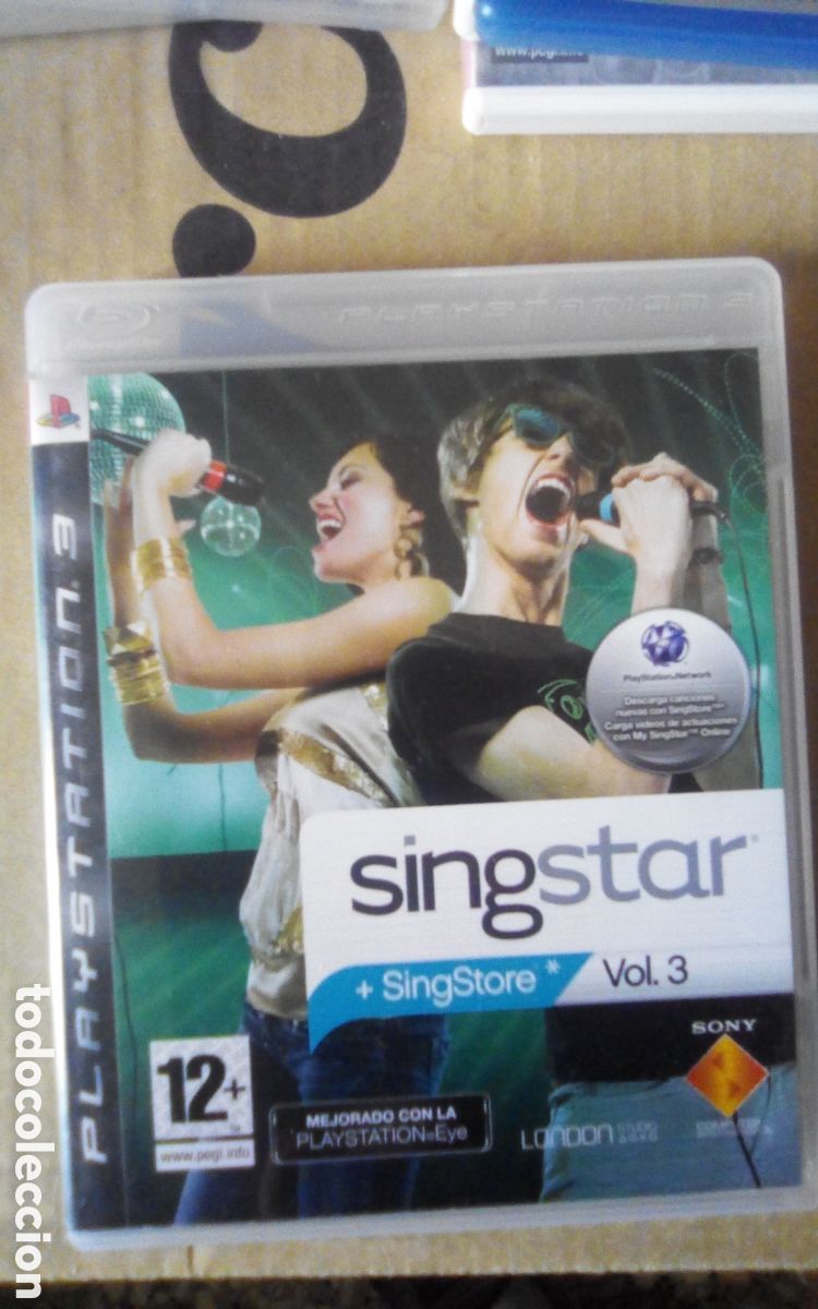Videojuegos y consolas: Caja vac&iacute;a PS3 del juego SingStar + SingStore vol. 3. Con libreto. A&ntilde;o 2008.