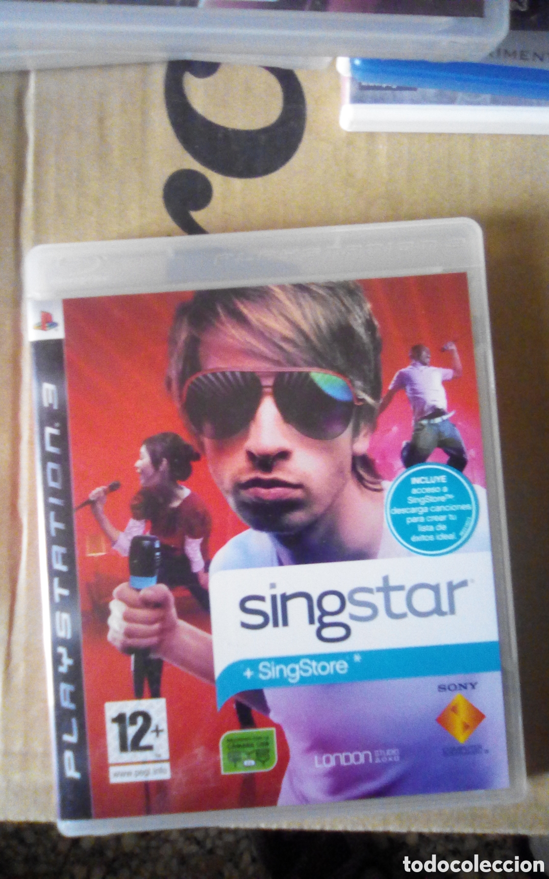 Videojuegos y consolas: Caja vac&iacute;a PS3 del juego SingStar + SingStore. Con libreto. A&ntilde;o 2007.