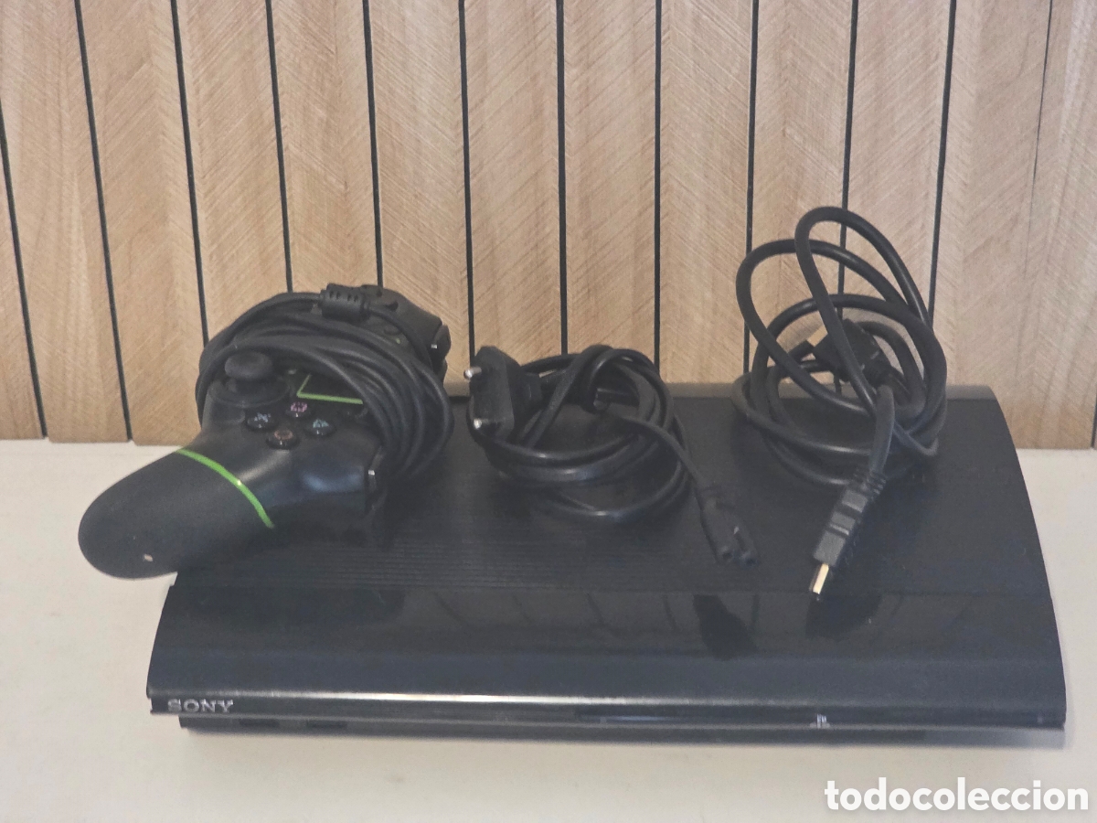 Videojuegos y consolas: PS3 Super Slim Negra + Mando + Cables - Foto 2