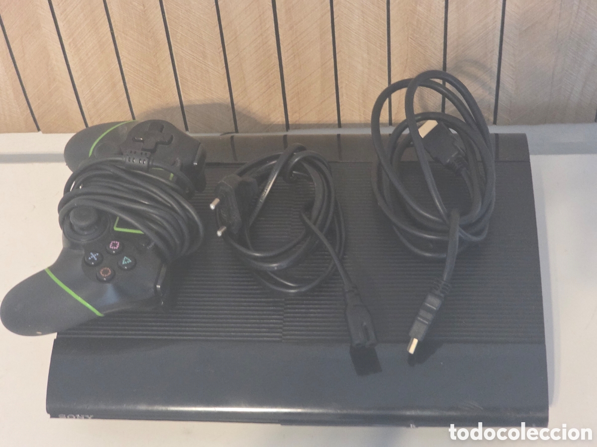 Videojuegos y consolas: PS3 Super Slim Negra + Mando + Cables - Foto 4