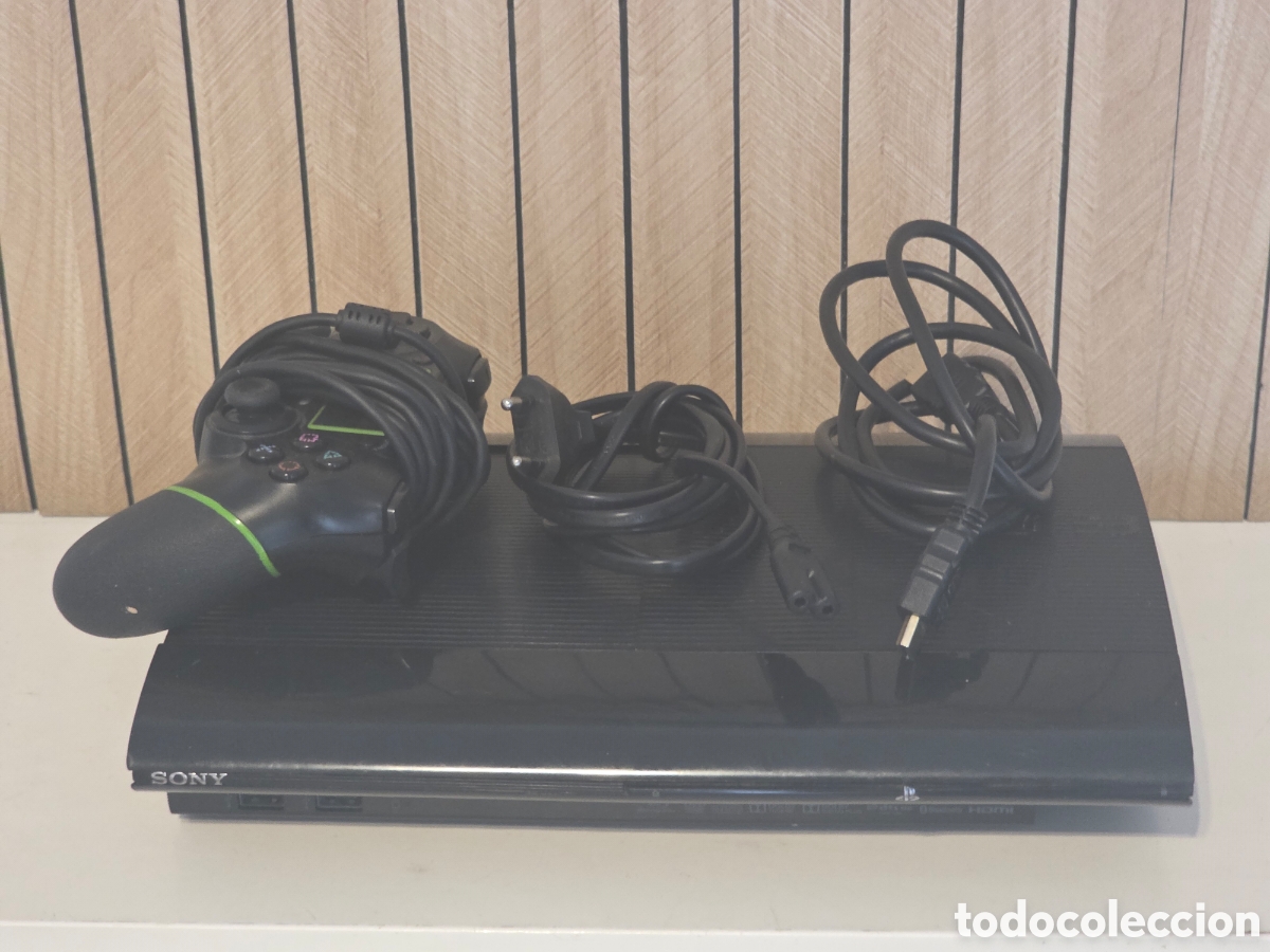 Videojuegos y consolas: PS3 Super Slim Negra + Mando + Cables - Foto 5