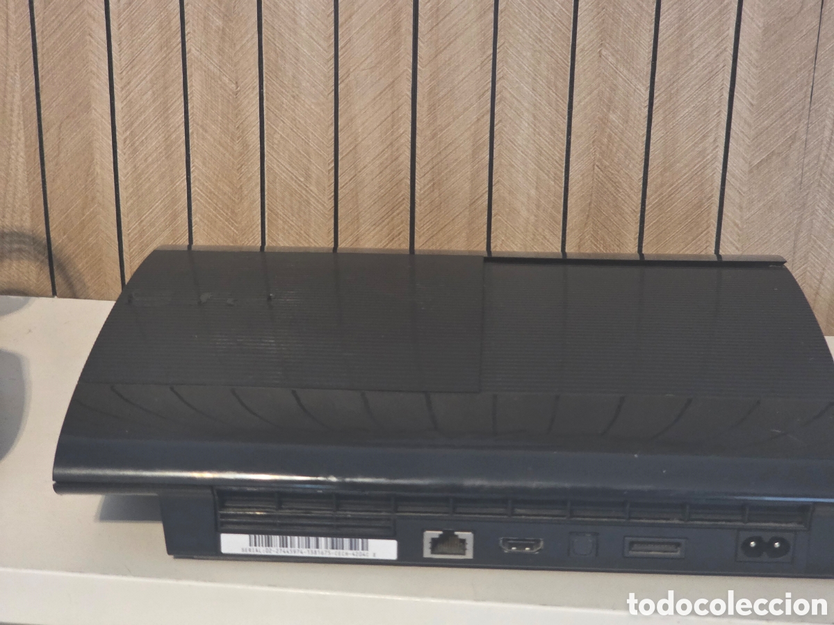 Videojuegos y consolas: PS3 Super Slim Negra + Mando + Cables - Foto 6