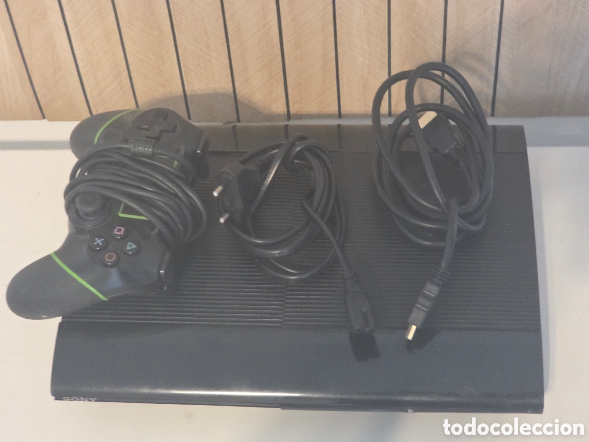 Videojuegos y consolas: PS3 Super Slim Negra + Mando + Cables - Foto 9