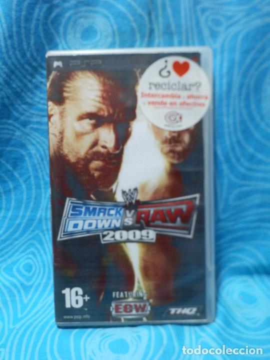 Videojuegos y consolas: JUEGO PSP SMACK DOWN vs RAW CON CAJA 2009 - Foto 1