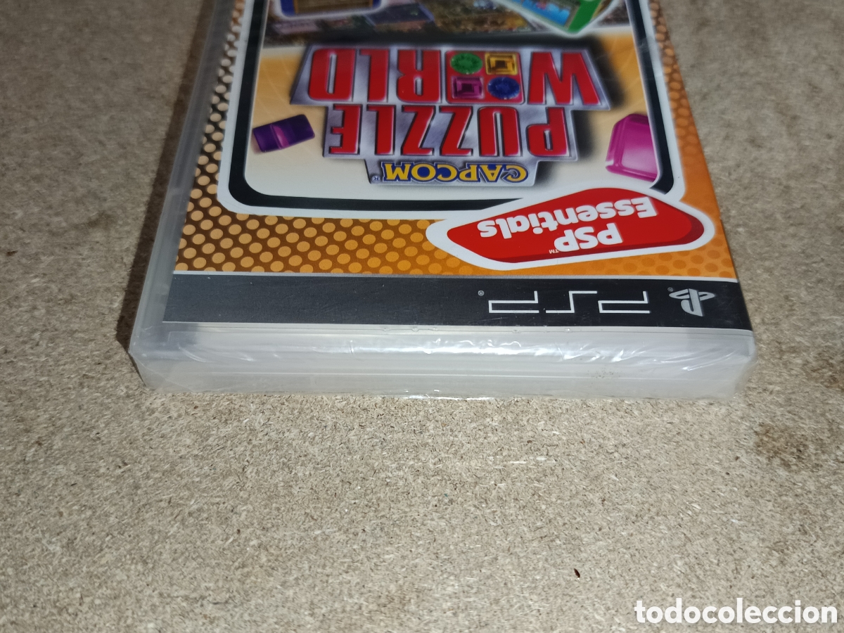 Videojuegos y consolas: PSP CAPCOM PUZZLE WORLD ESSENTIALS PAL ESP NUEVO - Foto 4