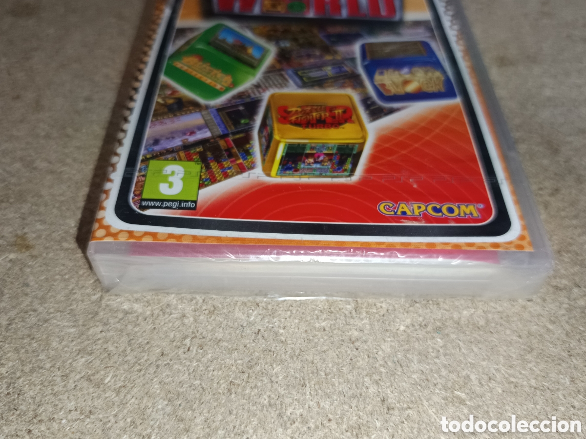 Videojuegos y consolas: PSP CAPCOM PUZZLE WORLD ESSENTIALS PAL ESP NUEVO - Foto 2