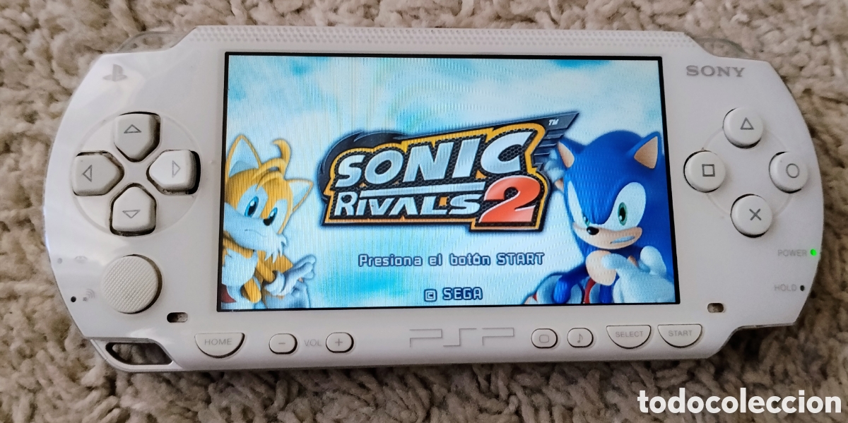 Videojuegos y consolas: Consola port&aacute;til Sony PSP 1004 en color blanco. Incluye el juego Sonic Rivals 2.