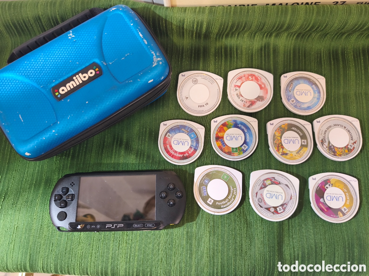 Videojuegos y consolas: Lote Sony PSP street con 10 juegos, cargador y estuche