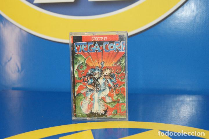 Videojuegos y consolas: Videojuego Spectrum: Mega-Corp. Dinamic Software, 1987.